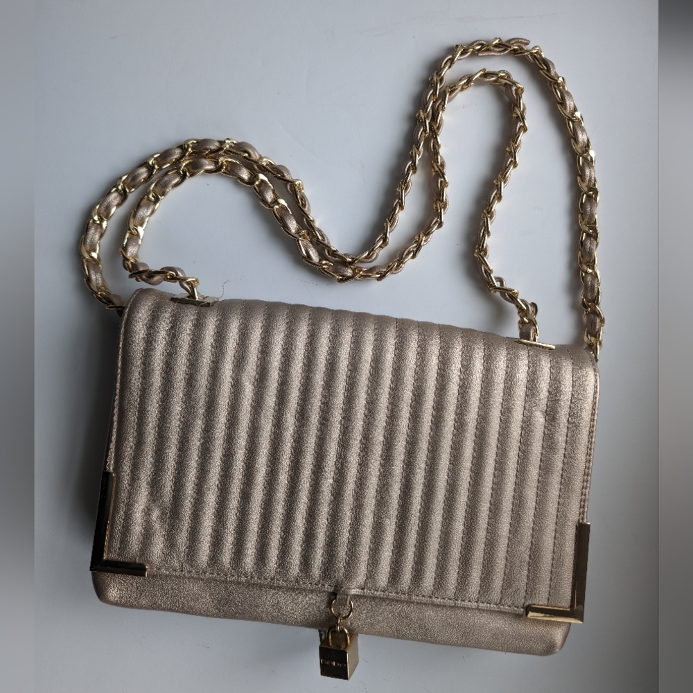 Bebe crossbody clutch purse chain and leather